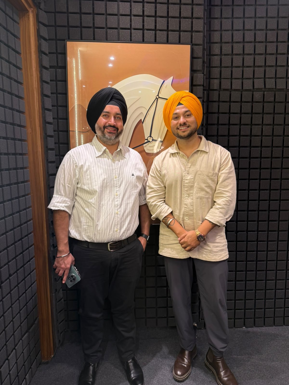 Deej Talks host with a guest in the recording studio